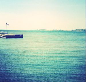 Scenic view of calm sea against clear sky