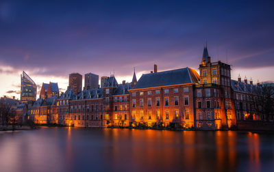 Binnenhof castle, dutch parliament, cityscape downtown skyline of hague in netherlands at sunset