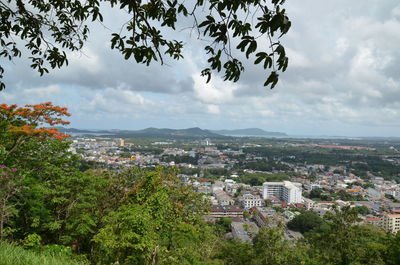 Aerial view of townscape against sky