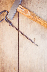 Old hand tools on wooden table