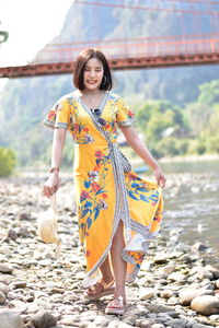 Portrait of smiling young woman outdoors