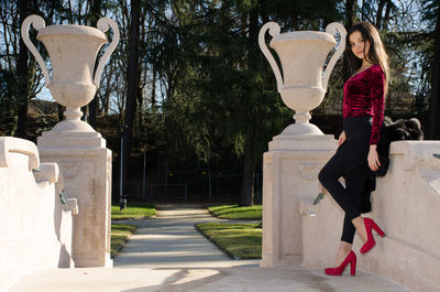 Portrait of beautiful woman posing in park