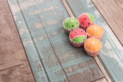 Set of muffins isolated over wooden seasoned wooden background