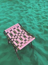 High angle view of seat on sand at desert