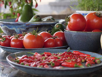 Close-up of fruits in container on table