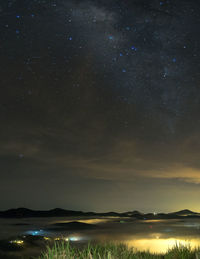 Scenic view of star field against sky at night