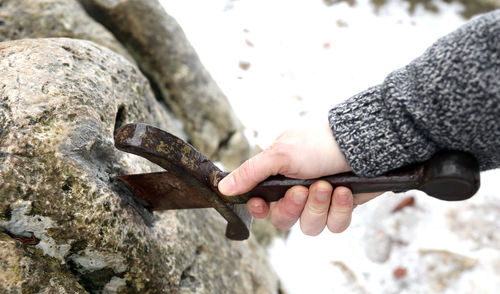 Close-up of man holding hand