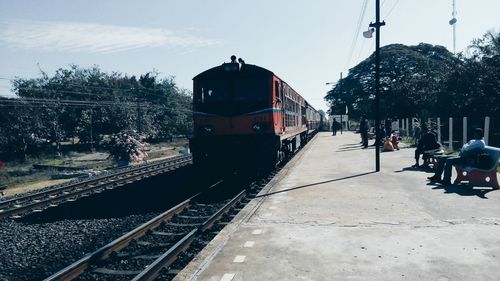 Train on railroad station platform against sky