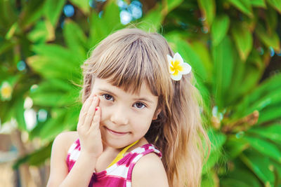 Portrait of young woman looking away