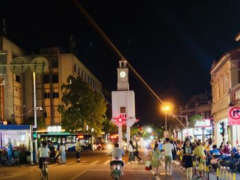 People on street at night