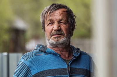 Portrait of man wearing mask outdoors