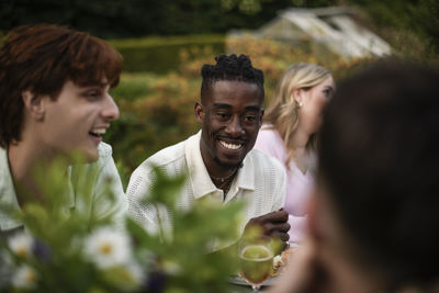 Side view of young man looking away