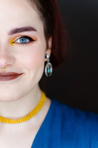 Close-up portrait of a smiling young woman