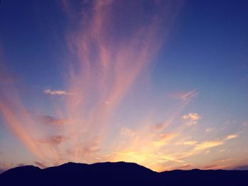 Scenic view of mountains at sunset