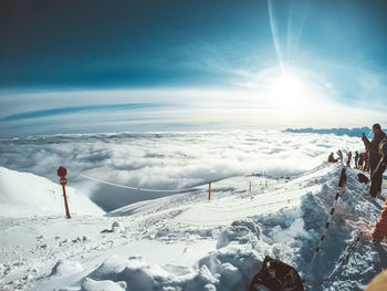 Scenic view of snowcapped mountain against sky during winter