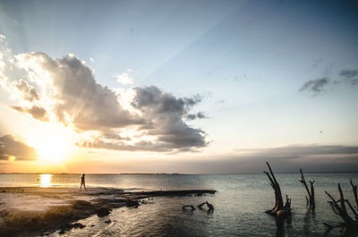 Scenic view of sea against sky during sunset