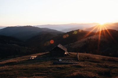 Scenic view of landscape against sky during sunset