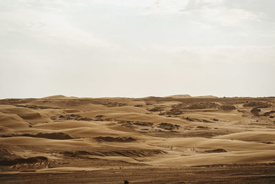 Scenic view of desert against sky