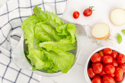High angle view of fruits in plate on table