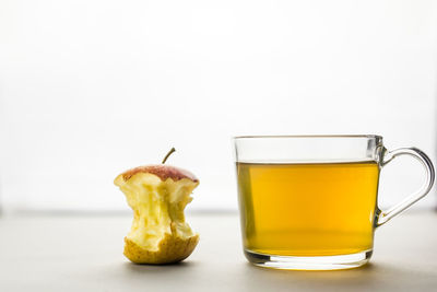 Close-up of drink against white background