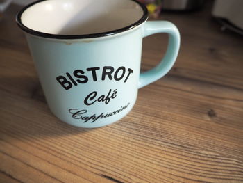 Close-up of coffee cup on table