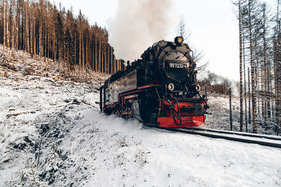 Train on railroad tracks during winter