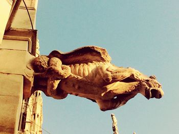 Low angle view of statue against clear sky