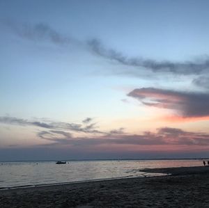 Scenic view of sea against sky at sunset