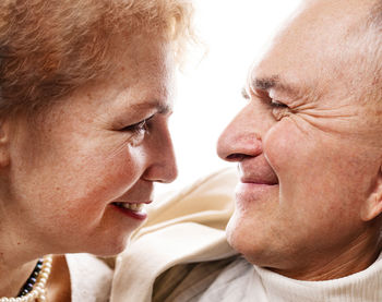 Close-up of happy senior couple loving each other