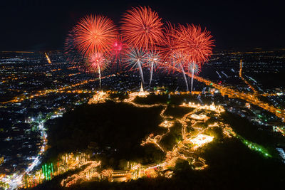 Firework display at night