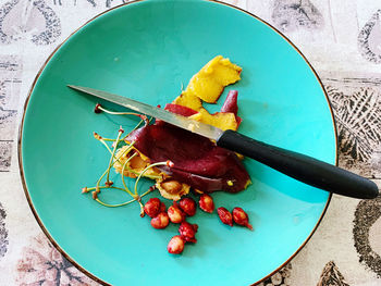 High angle view of fruits in bowl on table