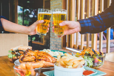 Close-up of man preparing food on table