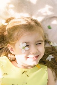 Close-up of cute girl with eyes closed