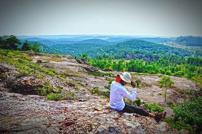 Man standing on hill