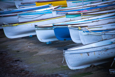 Boats moored at beach