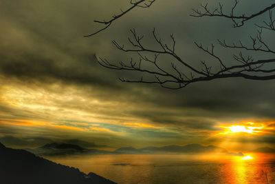 Scenic view of sea against cloudy sky