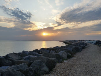 Scenic view of sea against sky during sunset