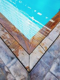 Full frame shot of swimming pool against blue sky