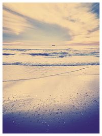 Scenic view of sea at sunset