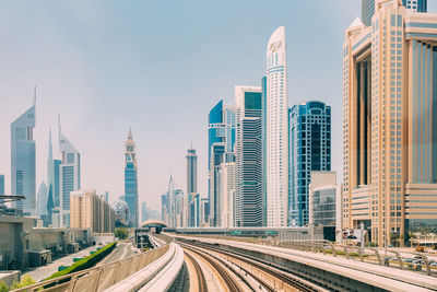 Modern buildings in city against sky