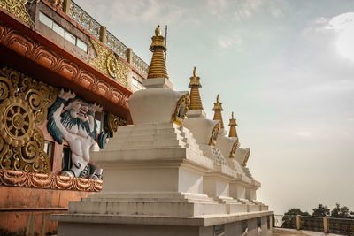 Low angle view of statue against sky