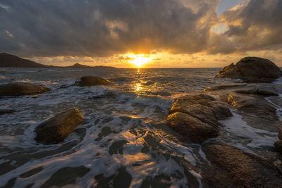 Scenic view of sea against sky during sunset