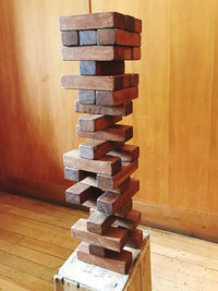 Stack of wood against wall