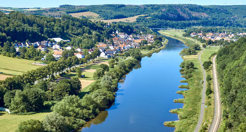 Aerial view of the weser near beverungen, germany, with fields and meadows in the foreground