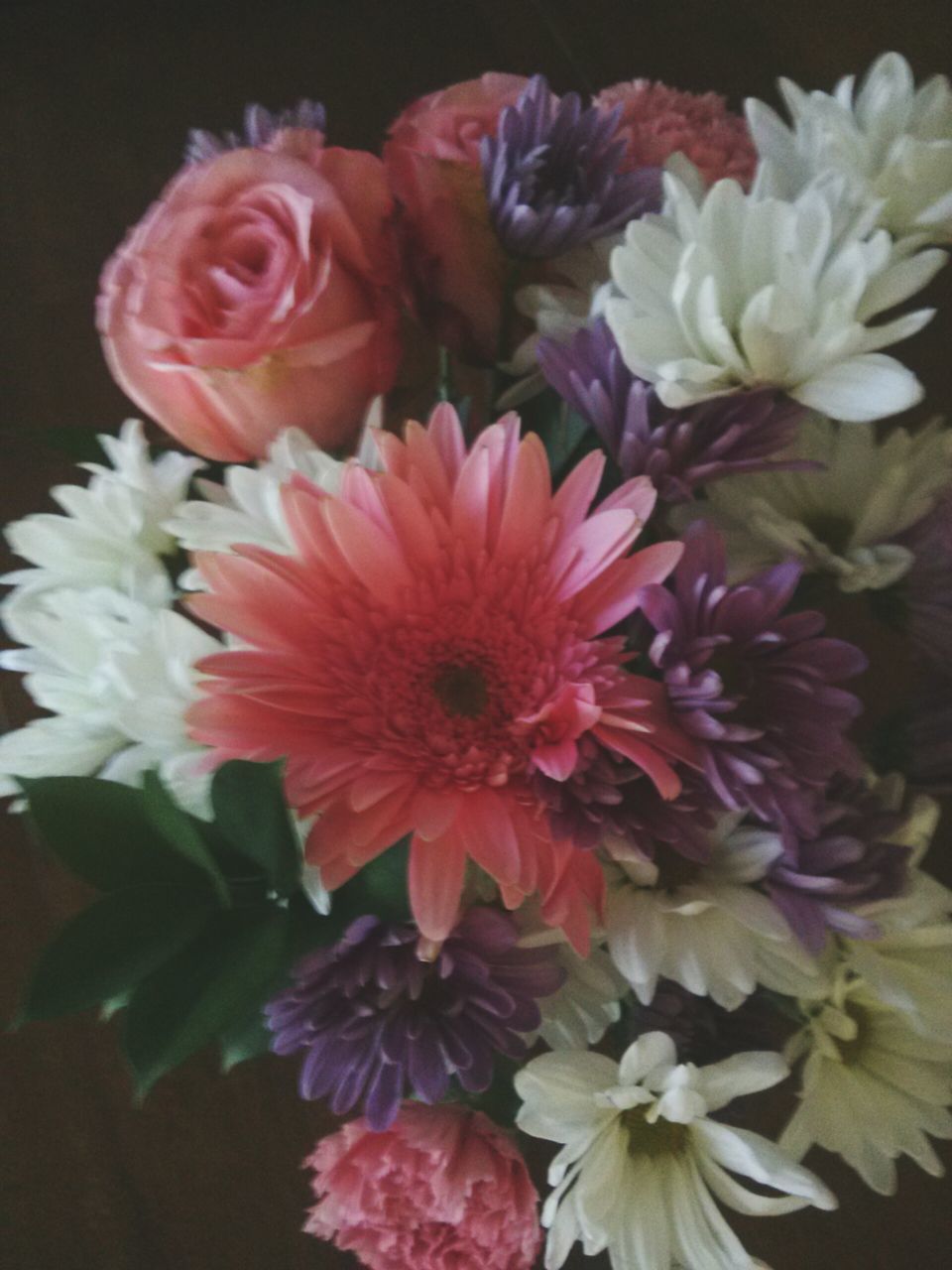 flower, petal, freshness, flower head, indoors, fragility, beauty in nature, close-up, rose - flower, pink color, bouquet, bunch of flowers, nature, blooming, high angle view, vase, flower arrangement, decoration, no people, red