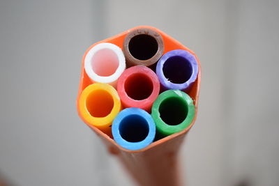 High angle view of multi colored toy on white background