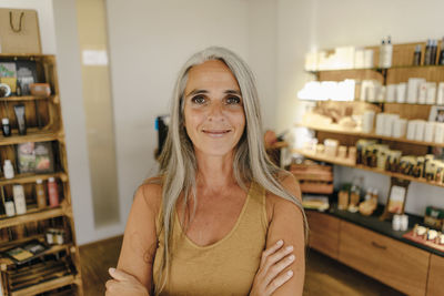 Portrait of smiling businesswoman in her shop