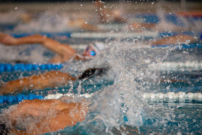 People swimming in pool