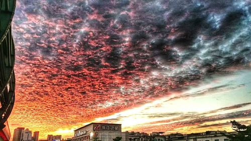 Low angle view of dramatic sky during sunset