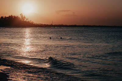 Scenic view of sea against sky during sunset